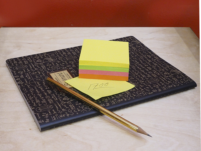 Photo of notepad and post-it notes.